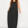 LIMITED COLLECTION - Mouwloze Maxi-jurk Met Zakken In Zwart