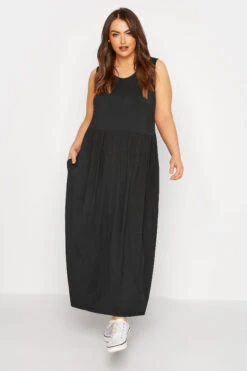 LIMITED COLLECTION - Mouwloze Maxi-jurk Met Zakken In Zwart