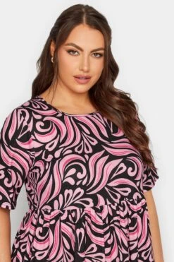 LIMITED COLLECTION - Aangerimpelde Midaxi-jurk Met Wervelprint In Zwart/roze -NAOMI Kleding Winkel 0e7f5a62 fa77 4f 215707 D