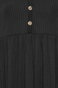 LIMITED COLLECTION - Geribbelde Midi-jurk Met Peplum In Zwart -NAOMI Kleding Winkel 5a1fa735 b16d 42 214245 Z