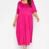 LIMITED COLLECTION - Aangerimpelde Midaxi-jurk Met Korte Mouwen In Felroze 1 LIMITED COLLECTION - Aangerimpelde Midaxi-jurk Met Korte Mouwen In Felroze -NAOMI Kleding Winkel 6e3972d6 6327 40 214693 A