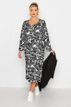 LIMITED COLLECTION - Midi-jurk Met Wervelprint & Lange Mouwen In Zwart
