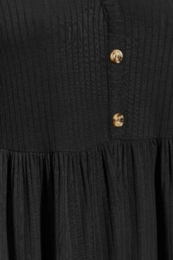 LIMITED COLLECTION - Geribbelde Midaxi-jurk Met Knoopdetail In Zwart -NAOMI Kleding Winkel 8b68503e 14b8 4b 215062 Z