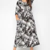Midaxi-jurk Met Bladerprint En Zakken In Zwart -NAOMI Kleding Winkel 8c3b6798 940e 4d 173282 A