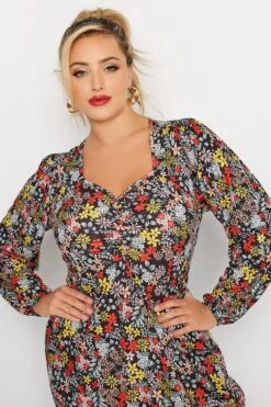 LIMITED COLLECTION - Midi-jurk Met Bloemetjesprint & Lange Mouwen In Zwart -NAOMI Kleding Winkel ba3b881a 4a12 4b 215210 E