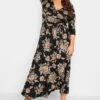 Maxi-jurk Met Bloemenprint & V-hals In Beige En Zwart 2 Maxi-jurk Met Bloemenprint & V-hals In Beige En Zwart -NAOMI Kleding Winkel edef04ec c74c 4e 301149 B