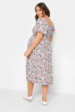 BUMP IT UP MATERNITY - Midi-jurk Met Bloemmotief En Smokwerk In Roze